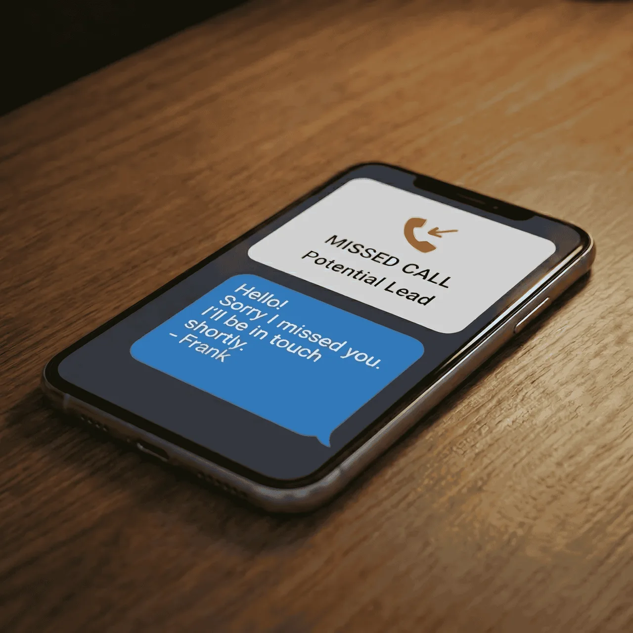 A phone showing an automatic text reply sent after a missed call